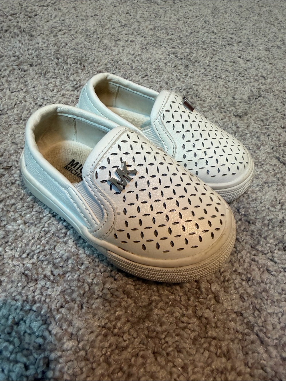 Michael Kors Baby White Perforated Slip-On Sneakers with Silver MK Accent